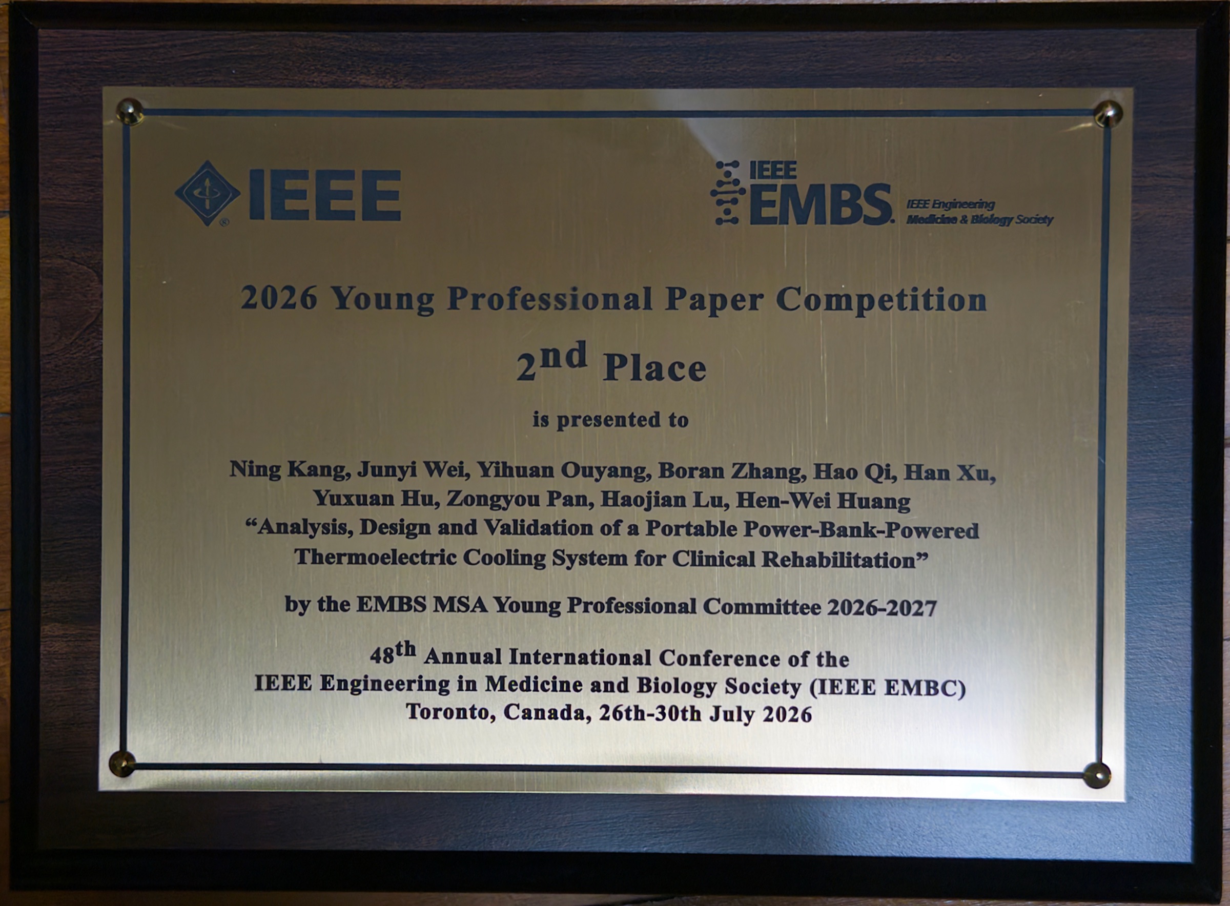 IEEE EMBS 2026 Young Professional Paper Competition 2nd Place plaque awarded to Kang Ning